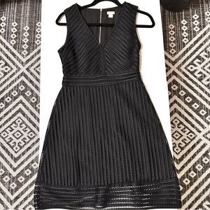 J Crew Black v neck dress, fit and flare.
Size 2 
Zipper back
Sheer top layer